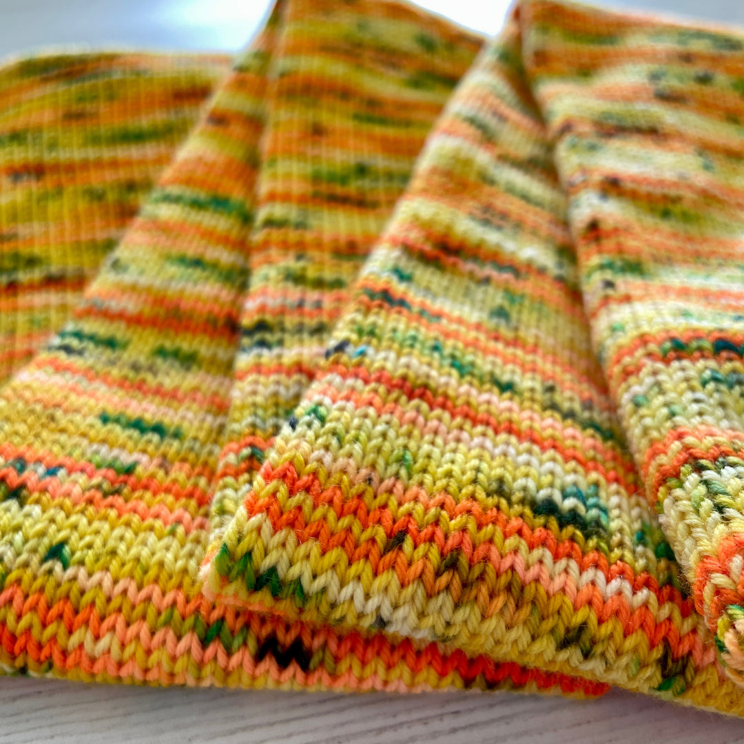 Ewe Tubes 60-stitch full skein tube in Knitted Wit Sock: Mango Street