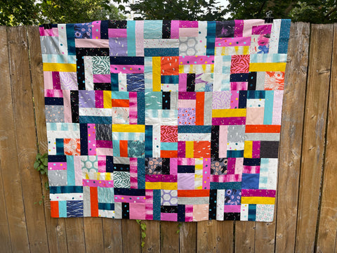 jelly roll twist quilt top